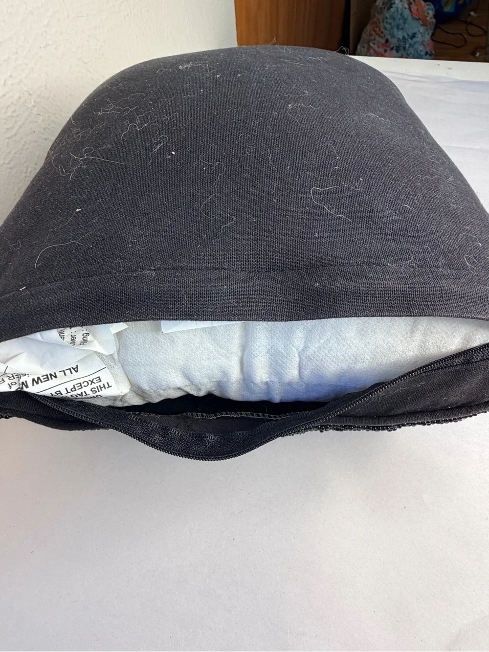 Black beaded 14” pillow with skull motif